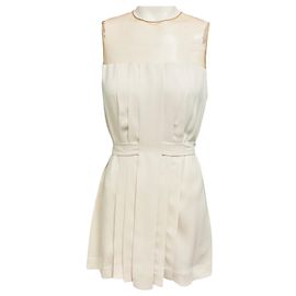 Blusa Akris Marfim / Bege sem mangas em seda com acabamento em tule plissado Bege