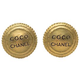 Boucles d'oreilles Chanel Gold Gold Plated Coco Round Clip On Doré
