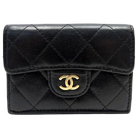 CARTERA CHANEL CLASSIC TIMELESS EN CUERO NEGRO ACOLCHADO MONEDERO Negro