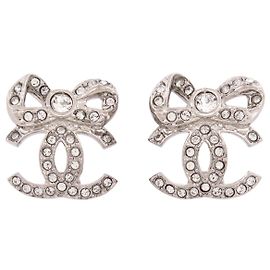 NUOVI ORECCHINI CHANEL LOGO CC FIOCCO E STRASS METALLO STEEL Argento