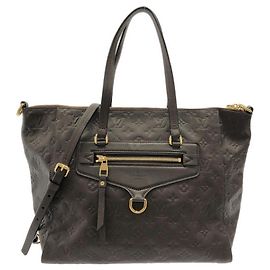 Borsa a tracolla Louis Vuitton Monogram Empreinte Lumineuse PM Marrone Altro Marrone scuro