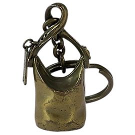 Portachiavi e charm per borsa in ottone Coach D'oro Metallico