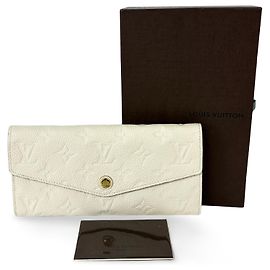 Carteira Louis Vuitton Sarah NM Monogram Empreinte em couro Bege