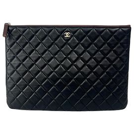 Chanel Classic O Case Pouch Quilted Lambskin with Rainbow Hardware Small Black