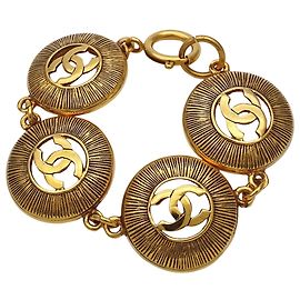 Bracelet à breloques Chanel en or Doré