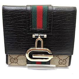 Gucci Women's Brown Leather and Canvas Tri-fold Wallet Brown