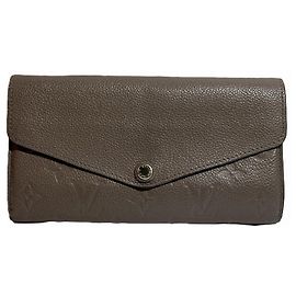 Louis Vuitton Monogram Empreinte Bi-fold Wallet Brown
