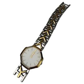 Montre vintage Yves Saint Laurent en acier inoxydable argenté Argenté