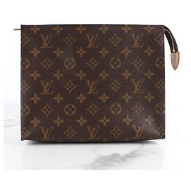 Louis Vuitton Pochette de toilette Marron