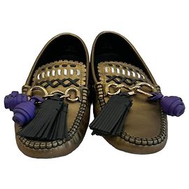 Mocassins Tod's Gommino en cuir doré métallisé Doré