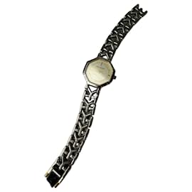 Yves Saint Laurent Montre bracelet vintage YSL en acier inoxydable Argent Or Argenté