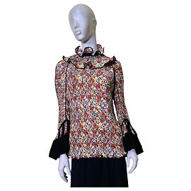 Top plissé floreale Tory Burch con scollo a volant e polsini in velluto Nero Multicolore