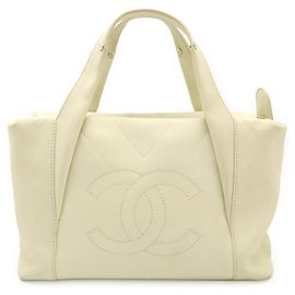Bolsa Chanel V-Stitch Coco Mark Cru