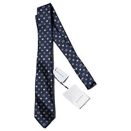 Cravatta Gucci stampata blu navy e oro Blu