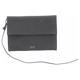 The row Schwarze Leder-Clutch Schwarz