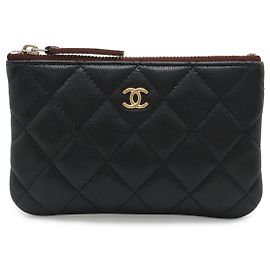 Pochette con cremallera Chanel Caviar Matelassé Small Negro
