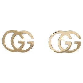 Orecchini Gucci GG Stud in oro giallo 18K Altro