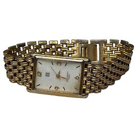 Relógio de pulso vintage Givenchy em ouro final dos anos 1990 ouro Dourado