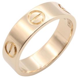 Bague Love de Cartier en or rose 18K Doré