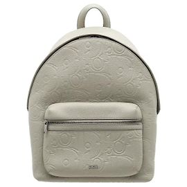 Christian Dior This backpack fully captures Dior's modern, refined sensibility, characterized by a clean silhouette great for everyday use. Made from premium leather material with a distinctive surface texture, Brown