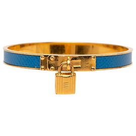 Bracciale Kelly di Hermès in blu e oro Blu D'oro
