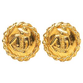 Orecchini a clip tondi Chanel Mademoiselle D'oro