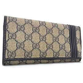 Portafoglio bi-fold Gucci GG Supreme marrone e blu navy in pelle Marrone Blu navy