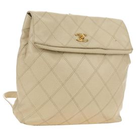 Mochila Bicolore CHANEL em Pele Caviar Bege e Ouro CC Auth 182907V Bege Dourado
