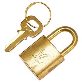 Ensemble cadenas et clé Louis Vuitton Doré Métallisé