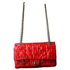 Chanel sac à main 2.55 Puzzle cuir vernis rouge Rouge