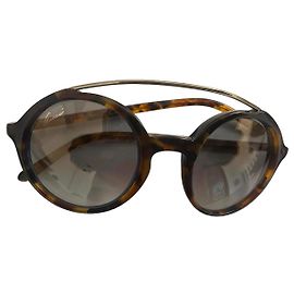 Gucci Occhiali da sole a farfalla tartarugati Marrone Altro