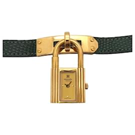 Montre Kelly d'Hermès, montre à quartz pour femme en or et vert avec cadenas Vert