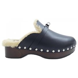 Hermès Shearling-Schuhe Schwarz