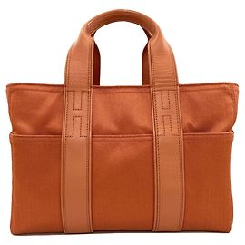Hermès Bolsa Hermes Acapulco PM Laranja