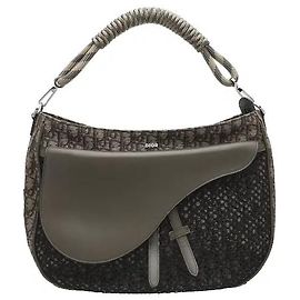 Dior Thanks to its distinctively flexible silhouette and open interior space, this bag conveniently holds everyday essentials. The sturdy top handle and strap allow for versatile styling as a tote, Other