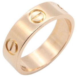 Bague Love de Cartier en or rose 18K Doré