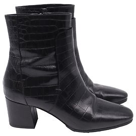 Bottines en cuir noir Givenchy avec embossage crocodile Noir