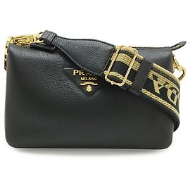 Pochette et sac à bandoulière Prada Vitello Daino Noir Blanc