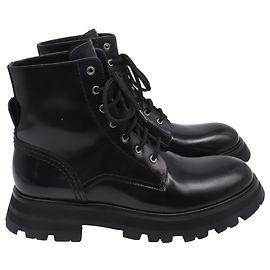 Botas Alexander McQueen Wander de sola exagerada em couro preto Preto