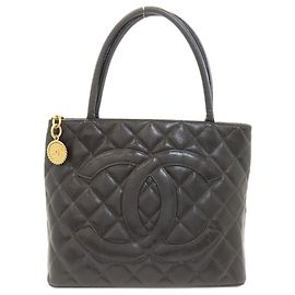 Borsa Tote Chanel Reissue in pelle di vitello martellata nera Nero