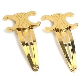 Céline Barrette Celine Triomphe Design en métal doré Doré