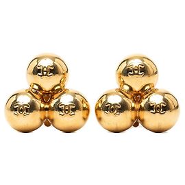 Orecchini clip vintage Chanel Coco Mark Ball Motif D'oro