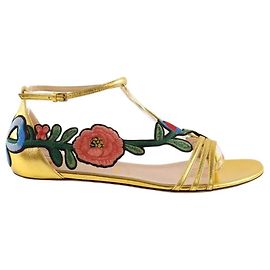 Gucci Sandales dorées Doré
