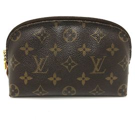Pochette en lona Monogram Louis Vuitton Castaño