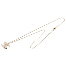 Collier pendentif Camellia plaqué or Gold CC Chanel Doré