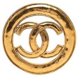 Broche redondo vintage Chanel Coco Mark Dourado