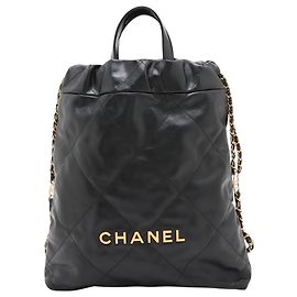 Sac à dos Chanel 22 en cuir de veau matelassé brillant noir Small Noir