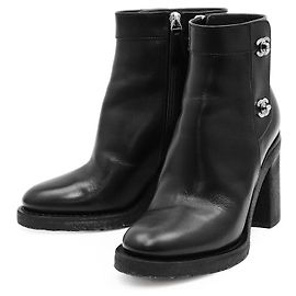 Stivaletti in pelle Chanel G31285 Nero Bordò