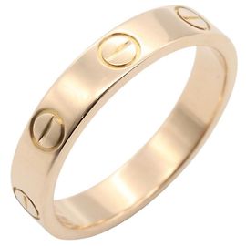Bague Mini Love de Cartier en or rose 18K Doré