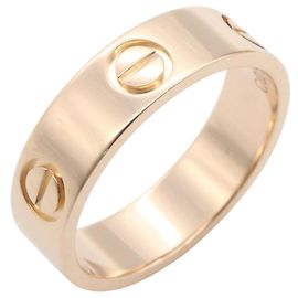 Bague Love de Cartier en or rose 18K Doré